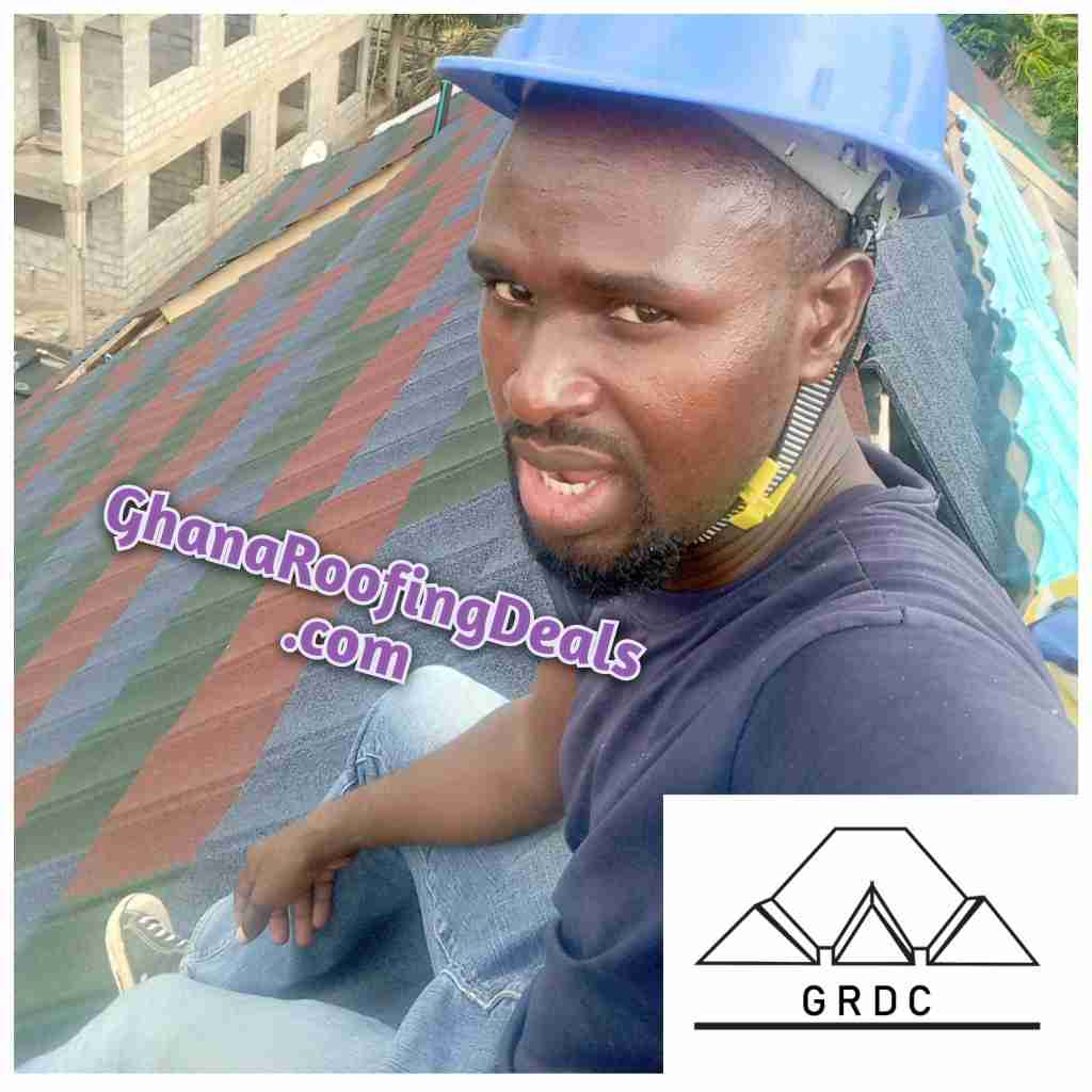 euro tiles roofing sheet installers on roof top in Ghana