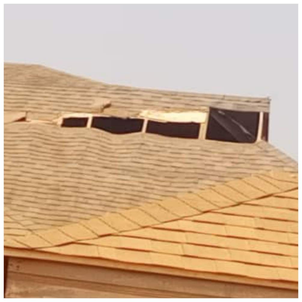Asphalt Shingles roof that has gone bad and some decayed and fallen off the roof before the house was even completed | pictured in Ghana